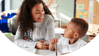 women smiling with child Occupational Therapy
