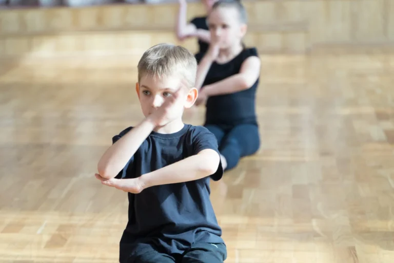 child performing exercises for children diagnosed with autism in a gym setting